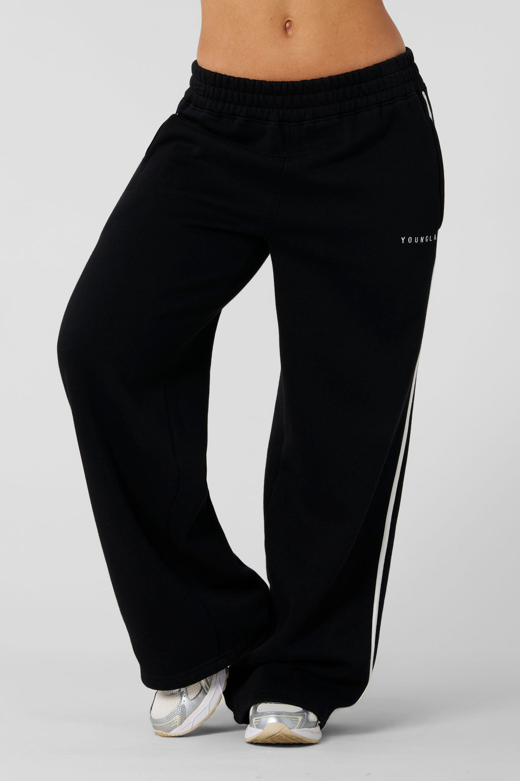W239 - Streak Joggers - Laid-back slouchy joggers designed for ultimate comfort and style. Perfect for lounging, layering, or stepping out. Pair with the matching tank for a minimal, cozy, effortless look in Black.