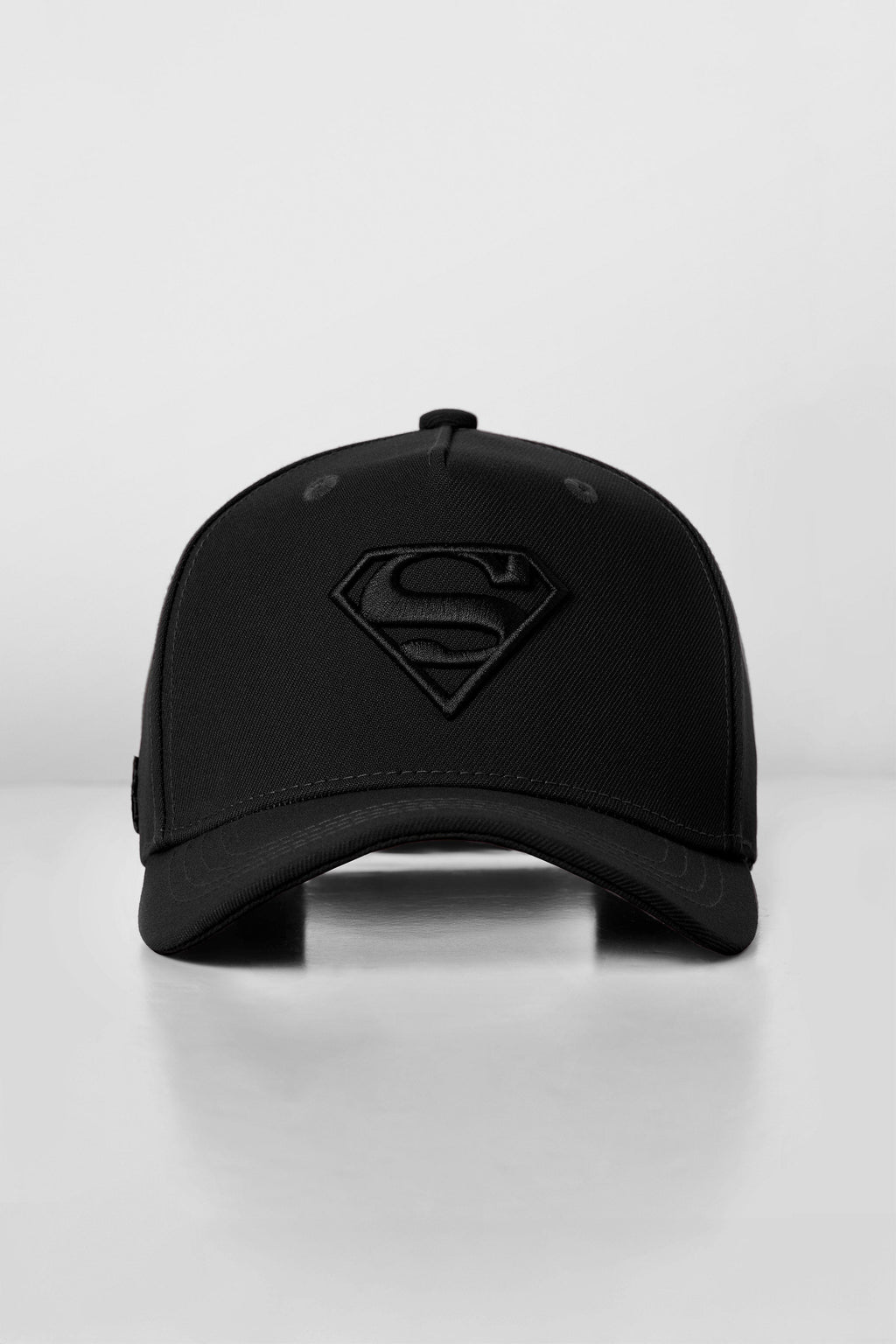 9092 - Superman Shield Hats – A-frame fit with tonal embroidered Superman logo front and YoungLA logo back. Bold, everyday hero style in Black.