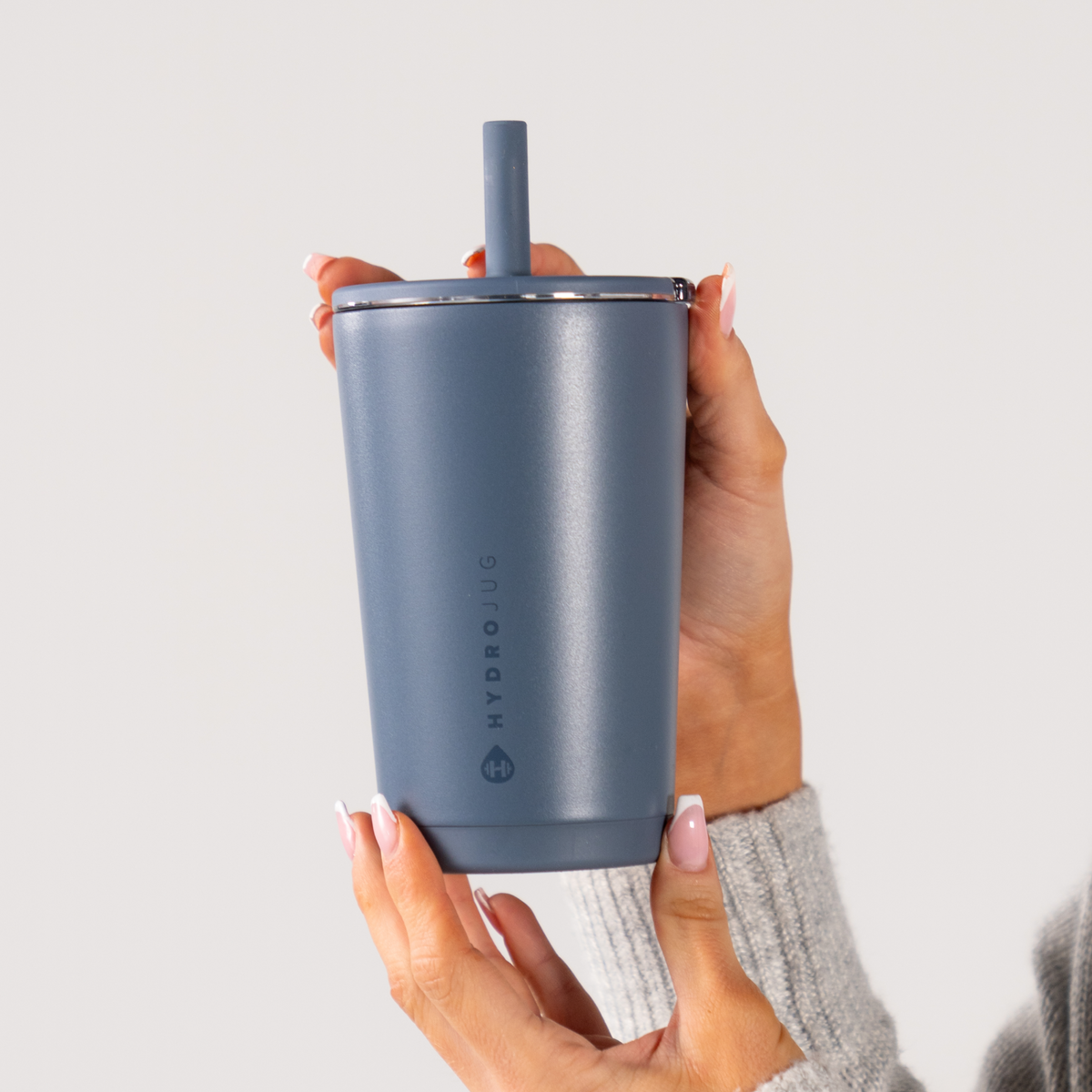 Hand Holding HydroJug Cascade Everyday Tumbler 14oz