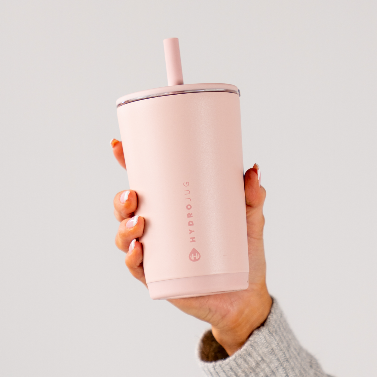 Hand Holding HydroJug Dusty Rose Everyday Tumbler 14oz