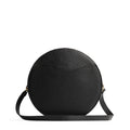 Pebbled--black | Large circle shaped leather bag with top zipper and carrying strap