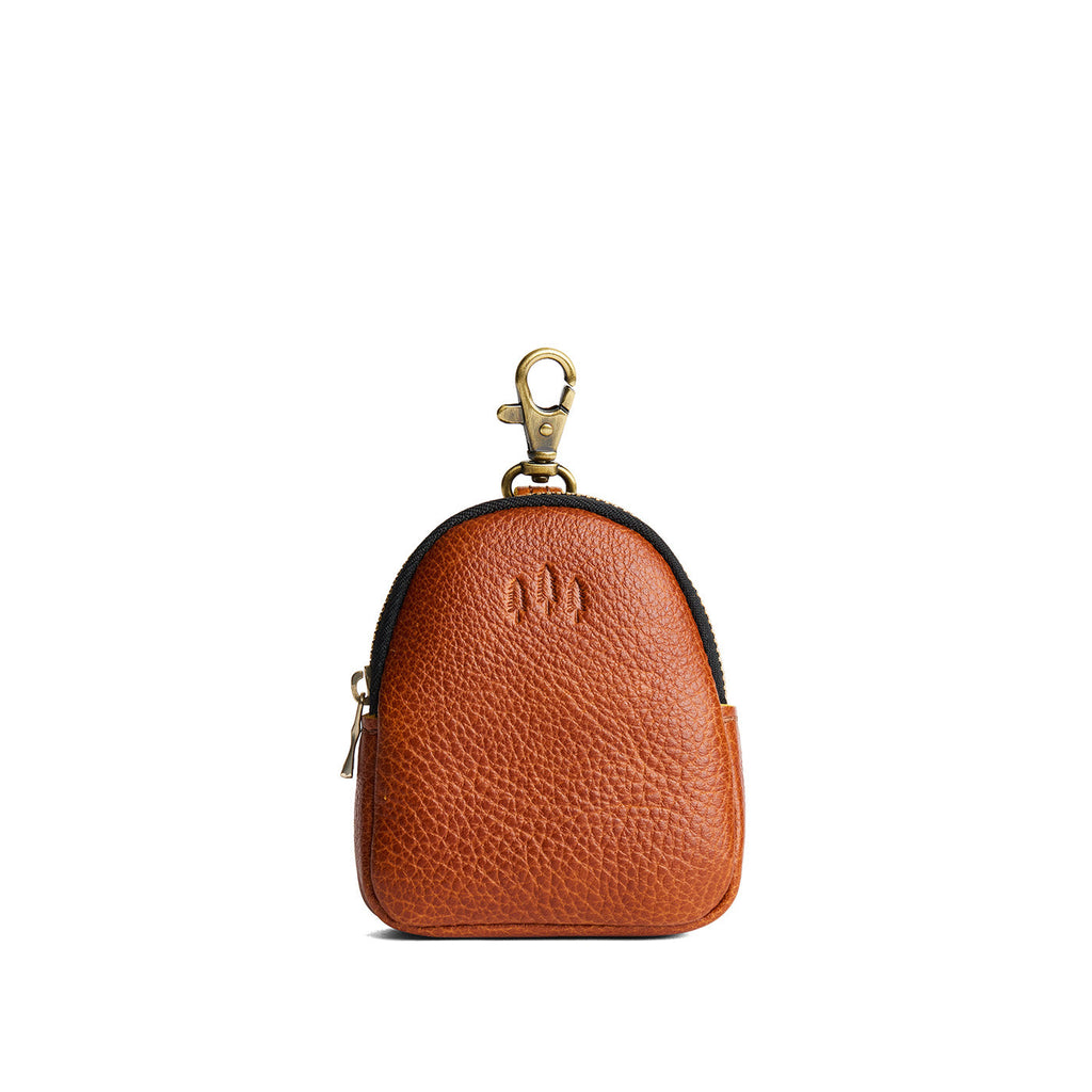 Sienna | Leather keychain pouch with zipper top, swivel lobster clasp, and debossed emblem of three PLG trees
