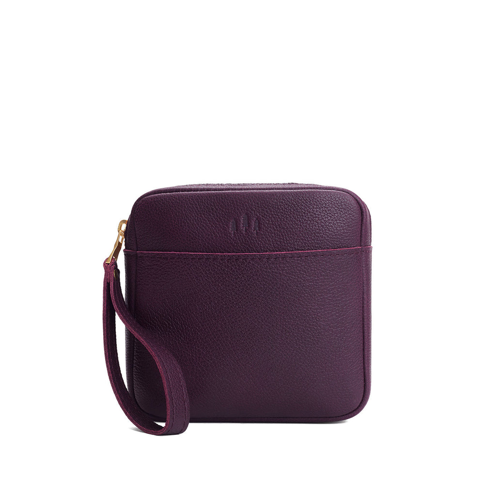 Plum | Square shaped pouch with zipper opening, wristlet, and front pocket